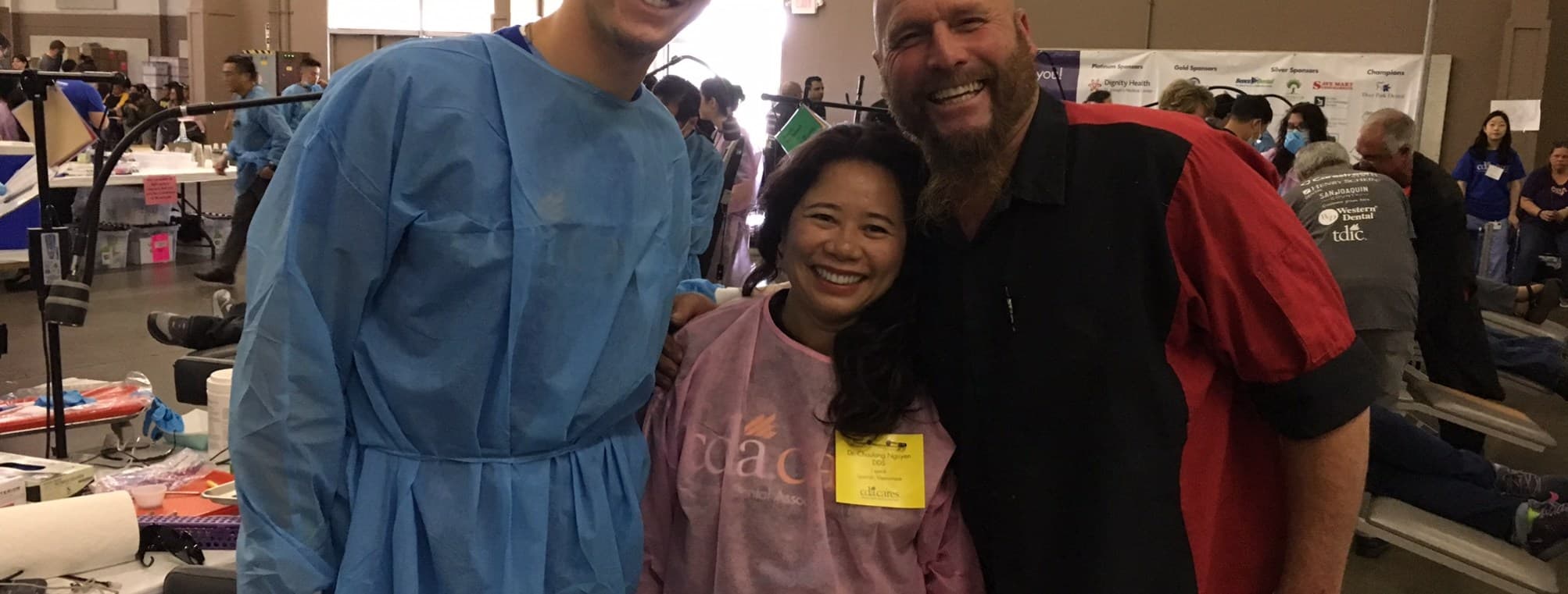 Scott and Dr. Nguyen's assistant Dr. Mitch at a volunteer event